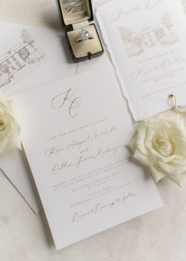 Kaia wedding stationery suite highlighting monogram design with RSVP and details cards