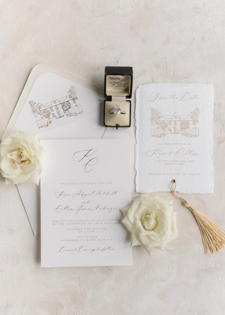 flat lay of wedding stationery featuring a venue illustration